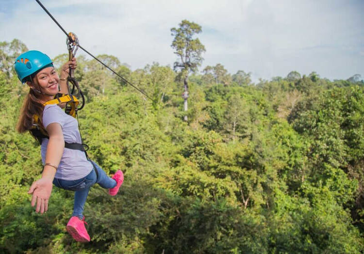 Zipline through forest is one of the must-try activities at this island