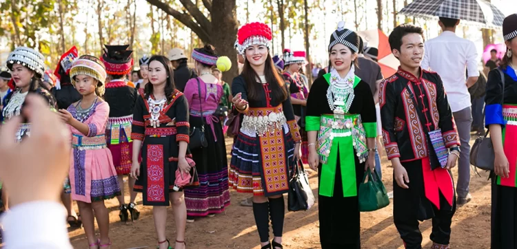 Hmong people in traditional costumes.