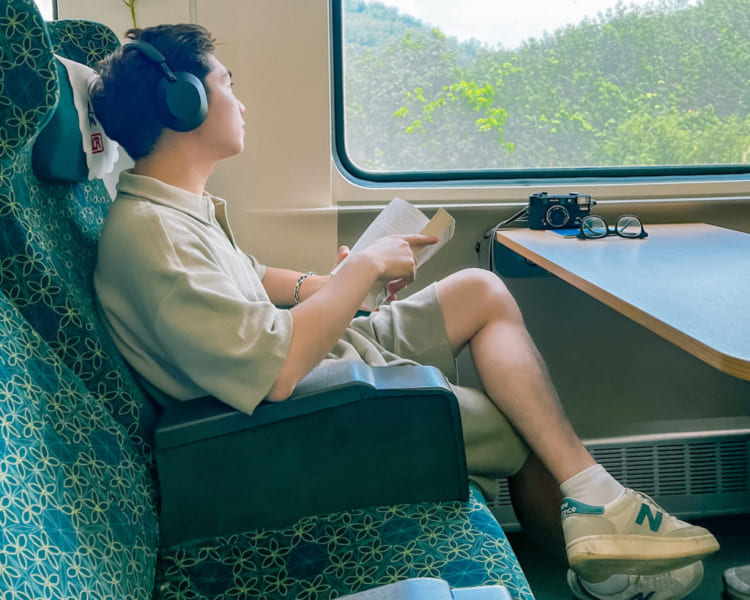 Passenger traveling on the Laos Railway with a spacious seat