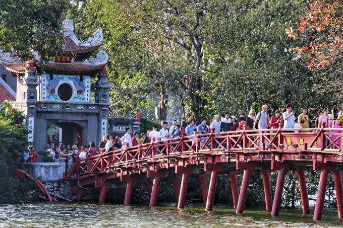 Tourists visiting pagoda in lunar new year