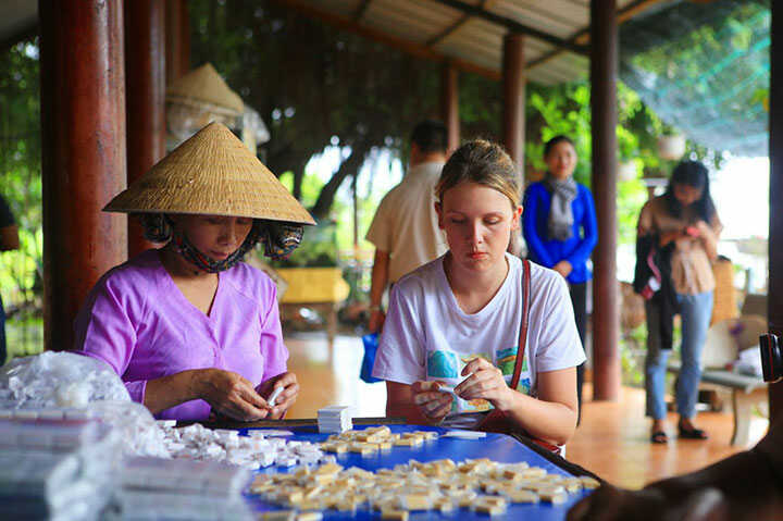 Visitors to Ben Tre can explore coconut candy factories and witness the candy-making process firsthand