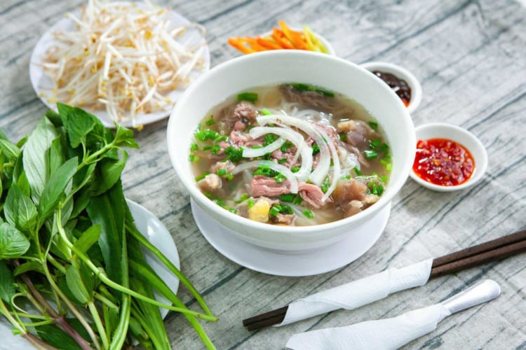 Pho, the quintessential Vietnamese dish, is more than just a soup; it’s a cultural experience.