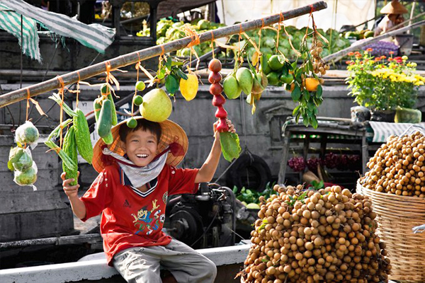 The floating markets pulsate with the energy of bartering, laughter, and the shared joy of buying and selling.