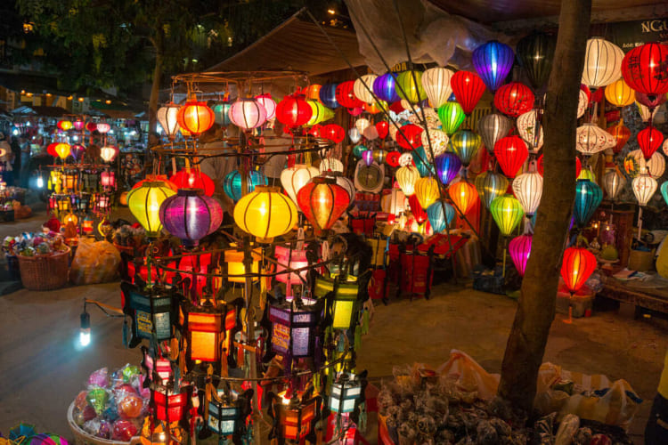 The beauty of Central Market at night is enhanced by the shimmering light of the lanterns.