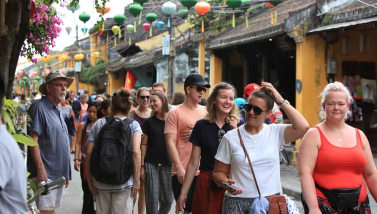 international tourists in hoi an