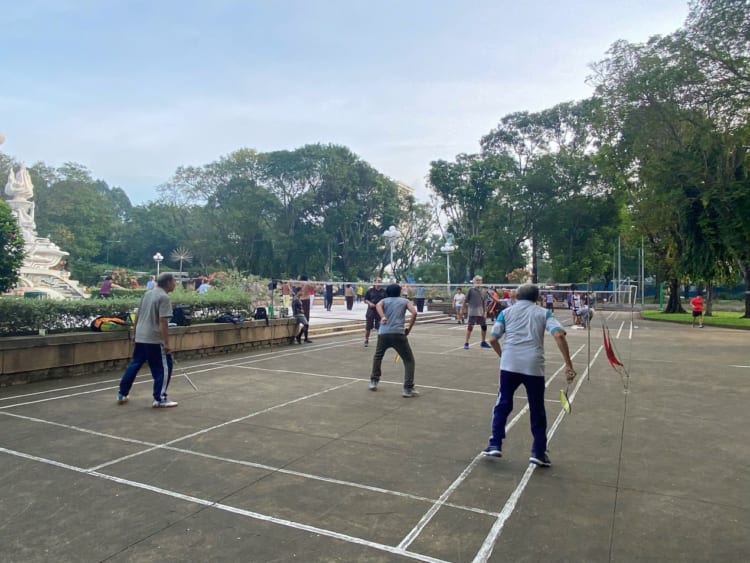 visitors exercise at le van tam park