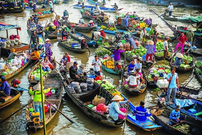 Bustling Cai Rang floating market in Can Tho