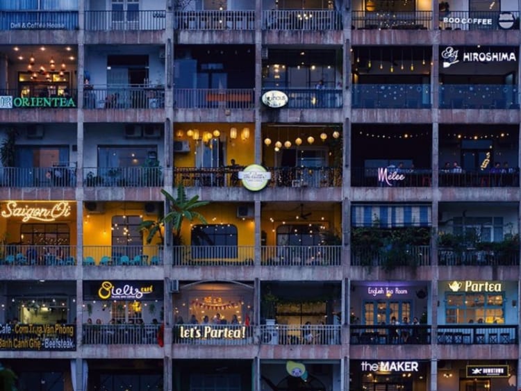 Cafe Apartment Saigon at night. 