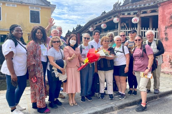 A group of visitors wearing relaxed but appropriate clothing during their Hoi An trip