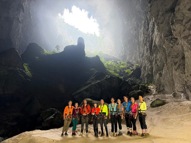 Travelers joining a guided Son Doong expedition through jungle and cave routes