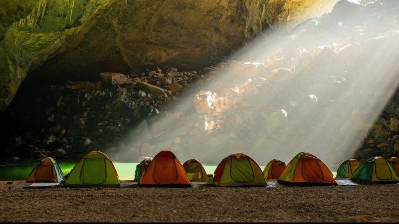 Son Doong Cave Tour explorers descending into the cave near the Doline 1 campsite
