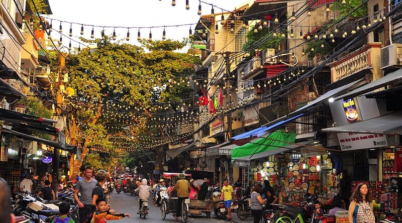 Old Quarter streets and local shops in the best places to stay in Hanoi for first-time visitors